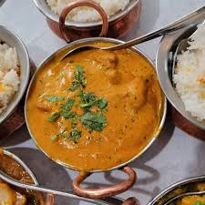 Cafe India signature dishes Chicken MakhaniLamb VindalooPalak Paneer﻿﻿